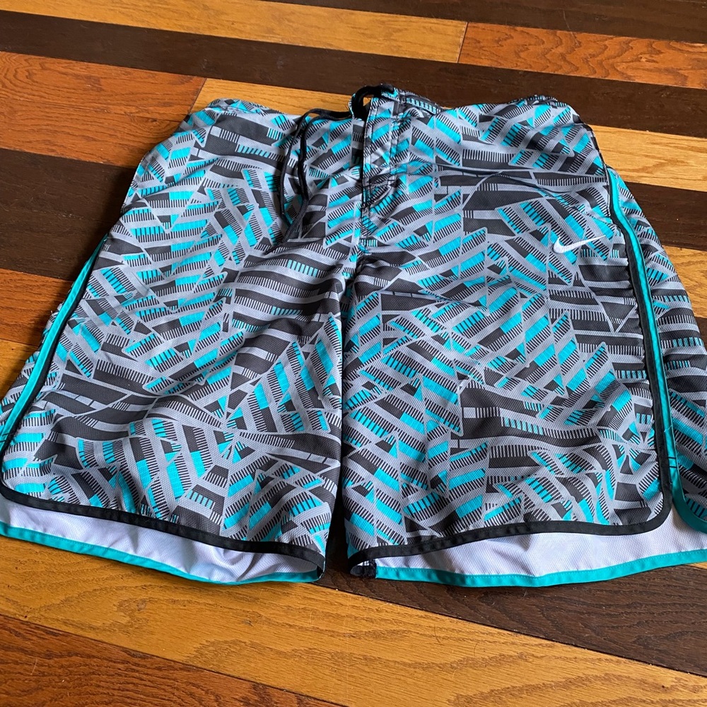 Nike swim trunks geometric patter black gray & turquoise worn a time or two